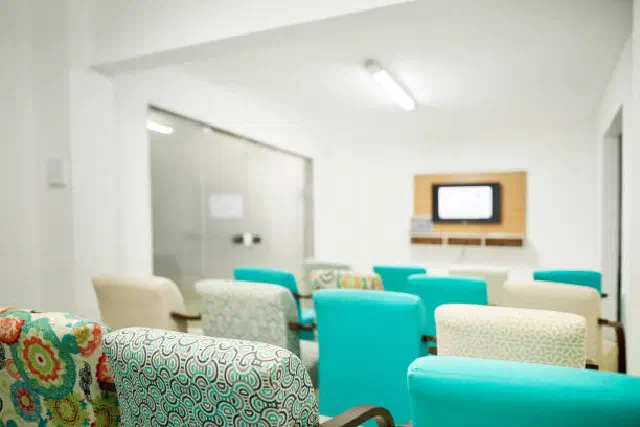 Comfortable seating in a spacious patient lounge
