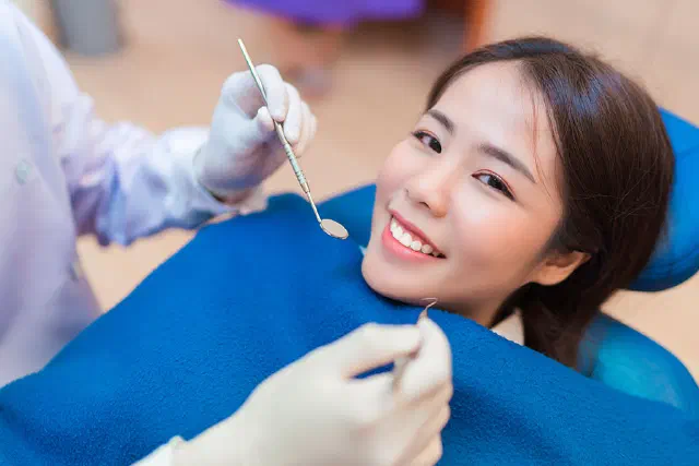 Dental professional providing a detailed consultation