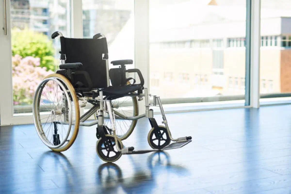 A wheelchair in a bright, accessible indoor space